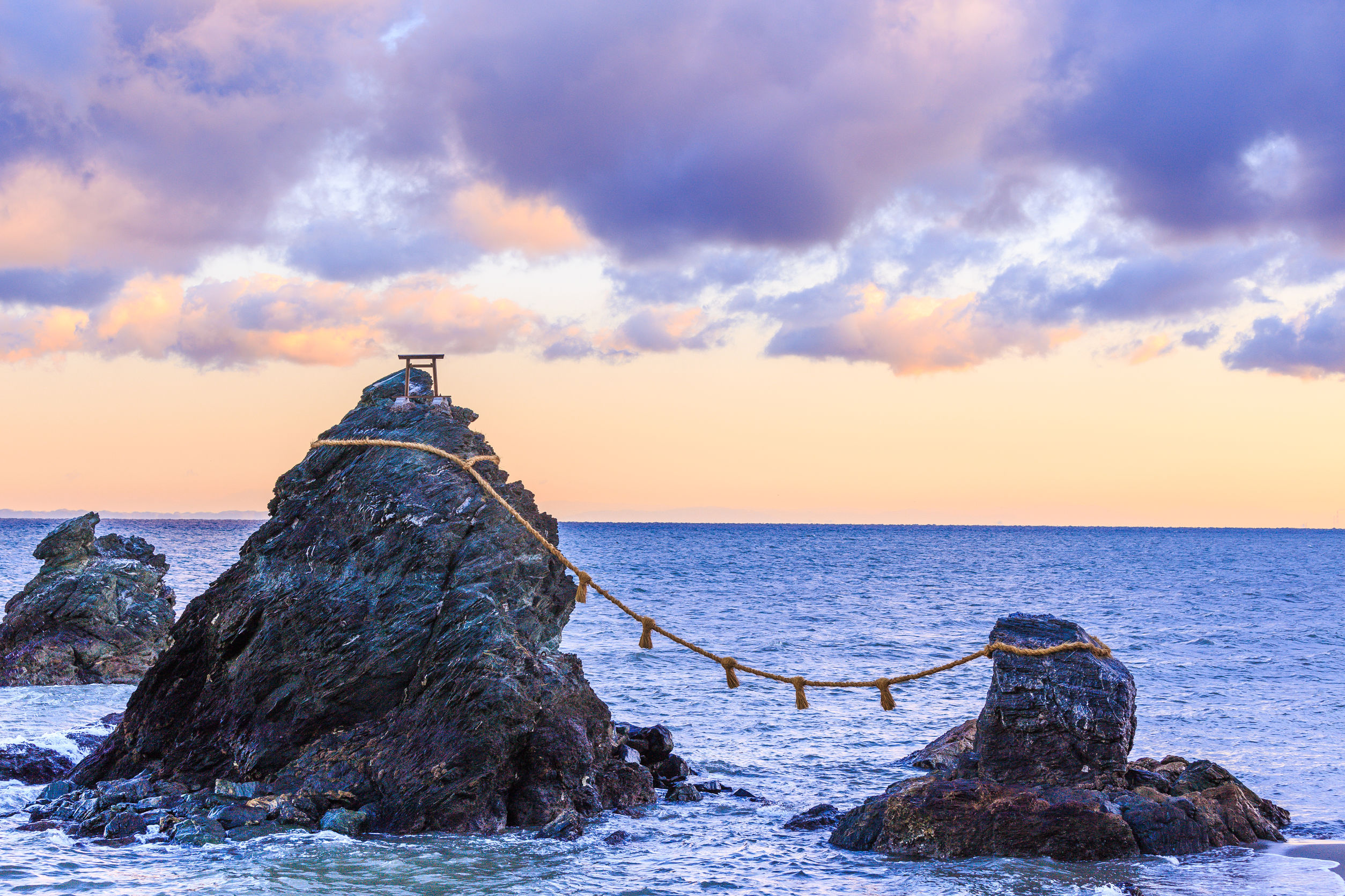 The Wedded Rocks are two sacred rocks in the ocean close to spiritual city of Ise