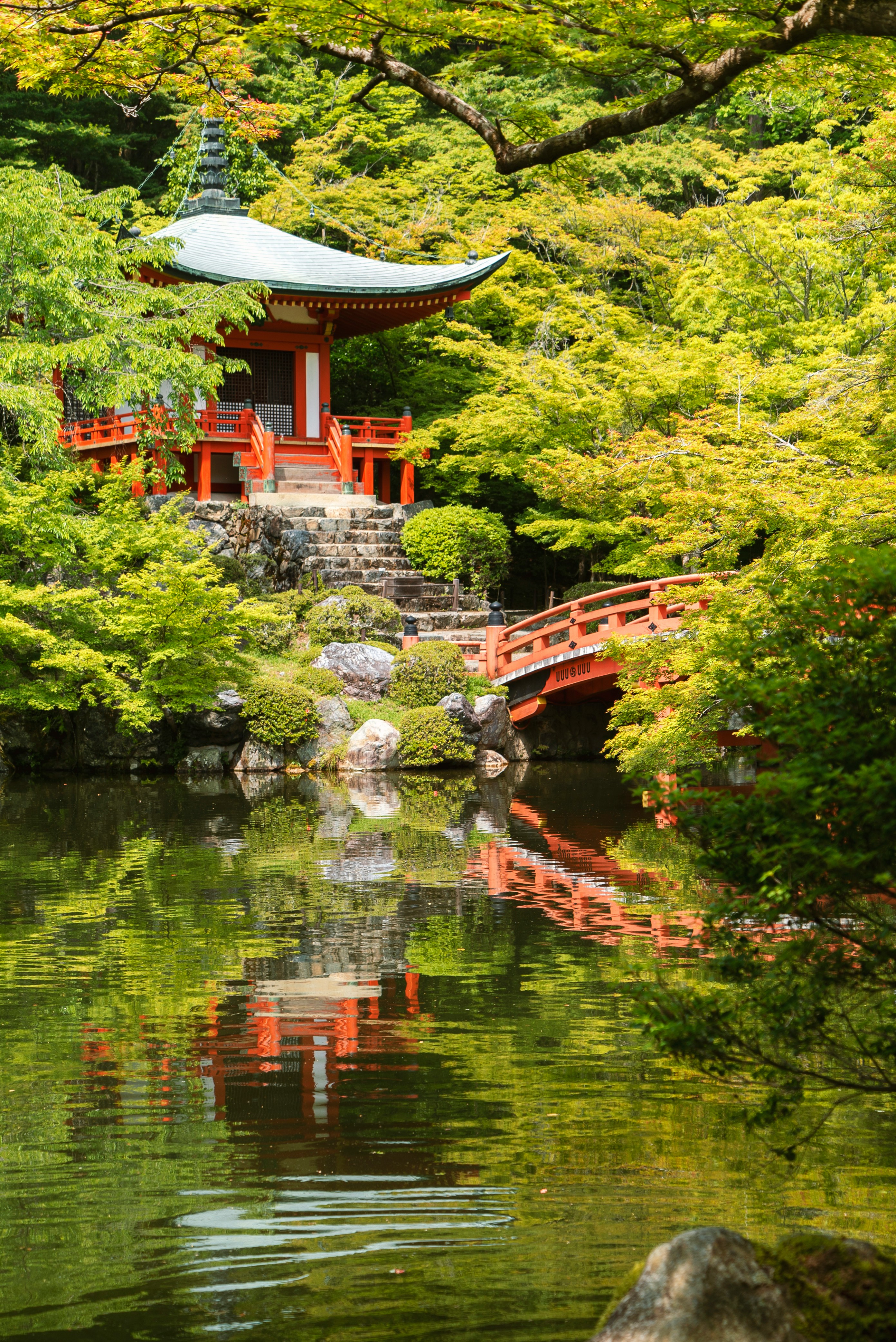 Red temple near body of water photo