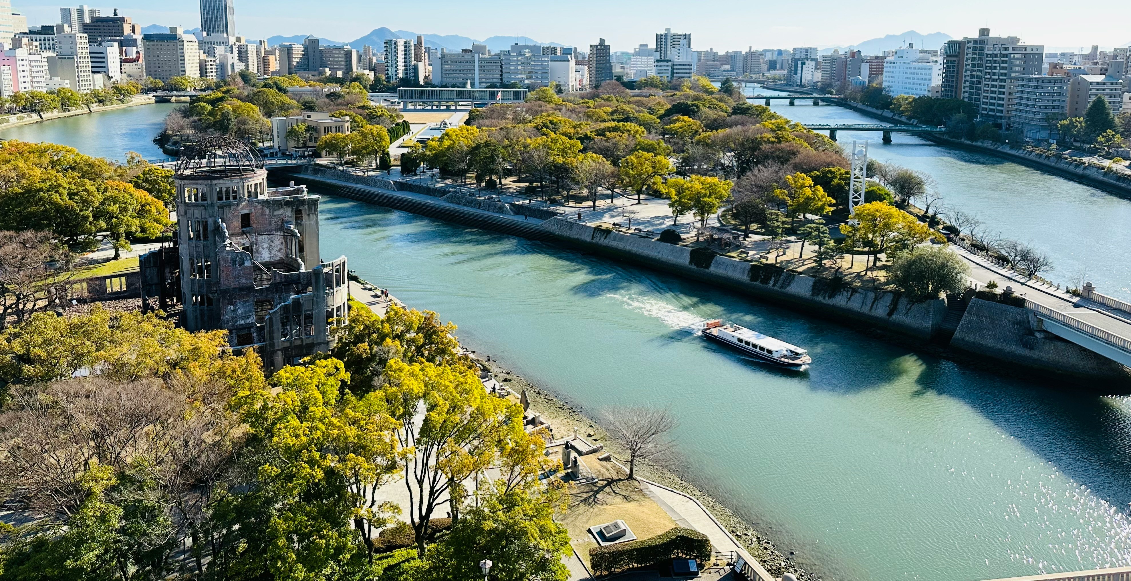 A river running through a city next to tall buildings photo