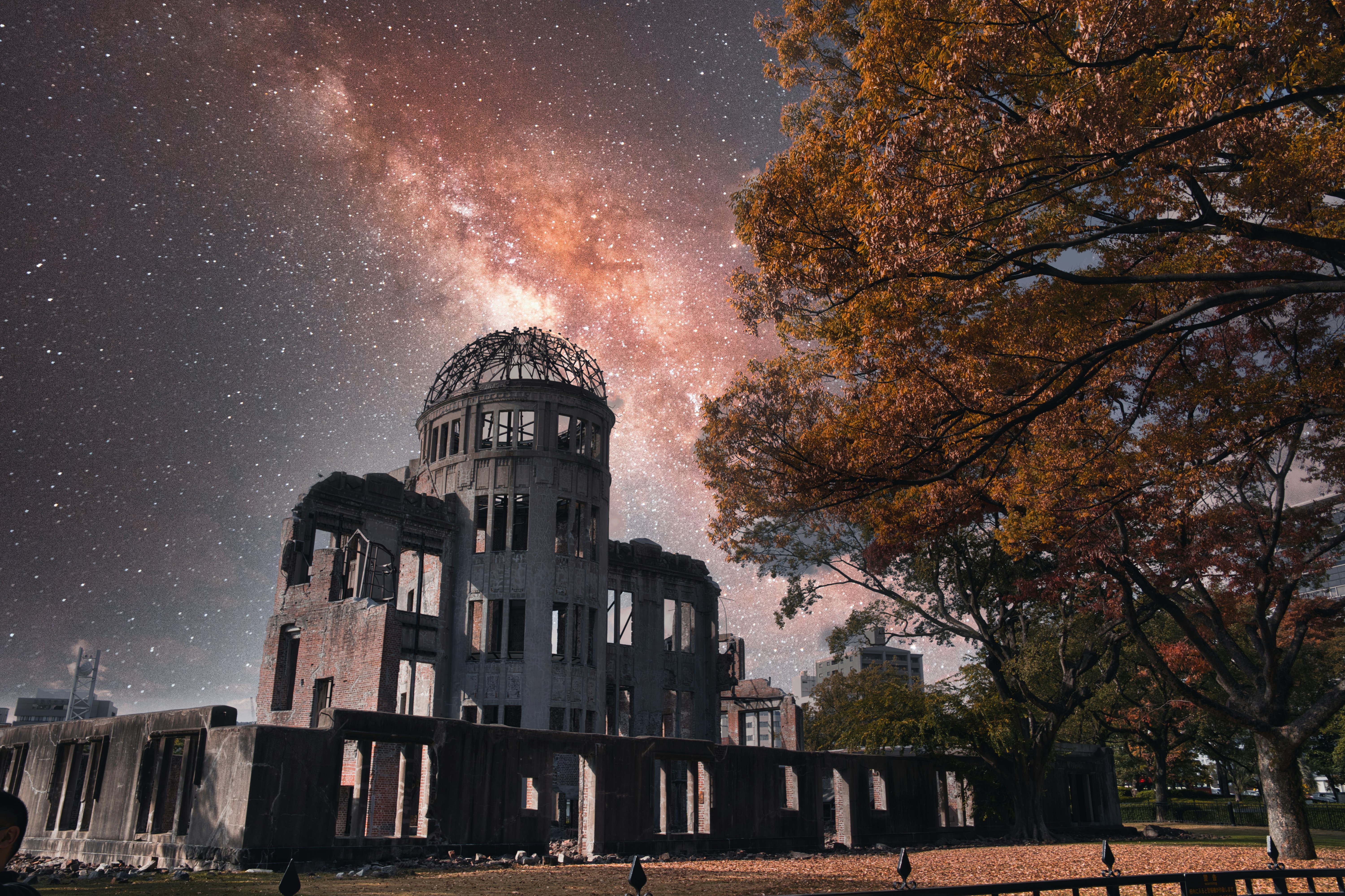 A large building with a sky full of stars