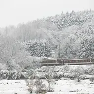 Train image under snow by John Doe