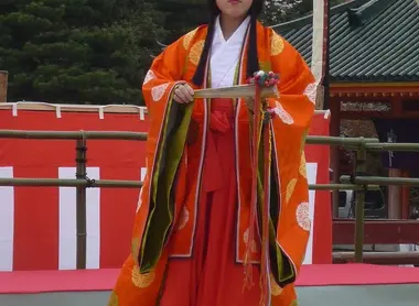 A miko, Shinto priestess.