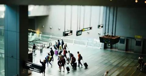  travelers in airport picture kansai international