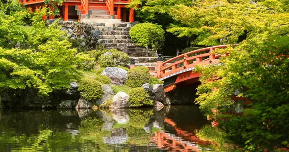 Red temple near body of water photo