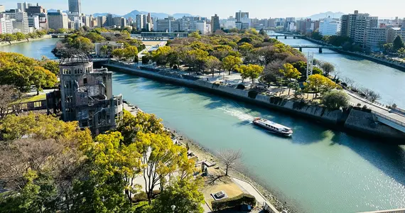 A river running through a city next to tall buildings photo